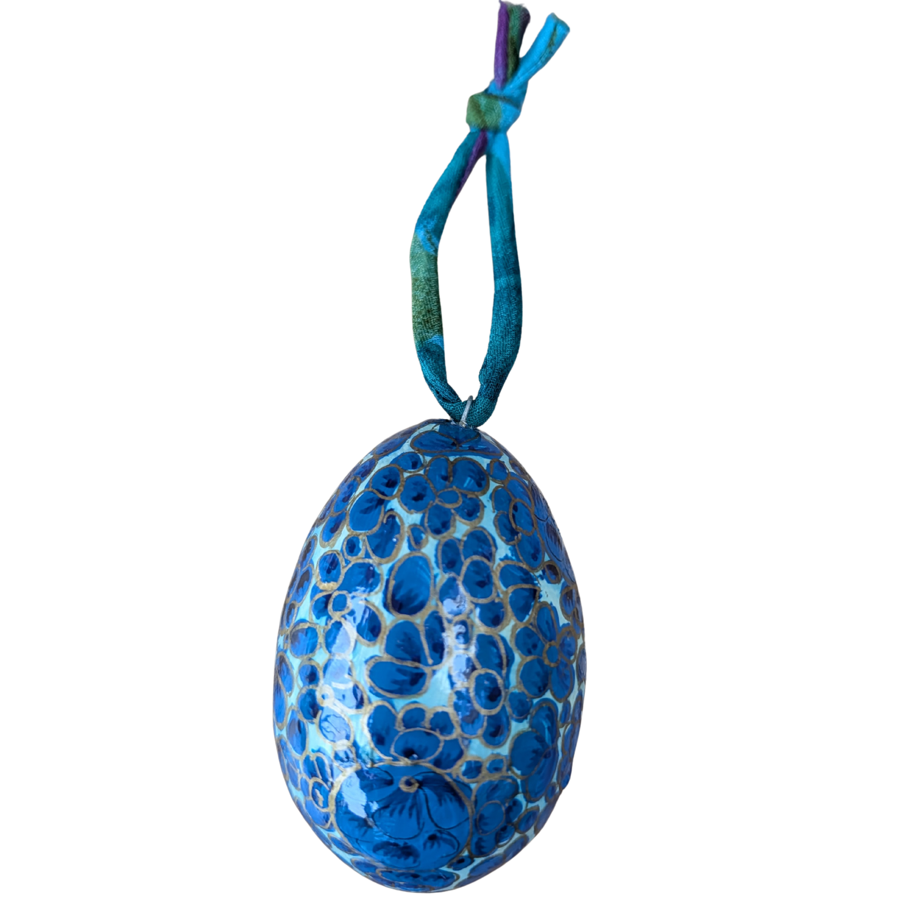 Blue egg-shaped ornament with textured surface on a white background