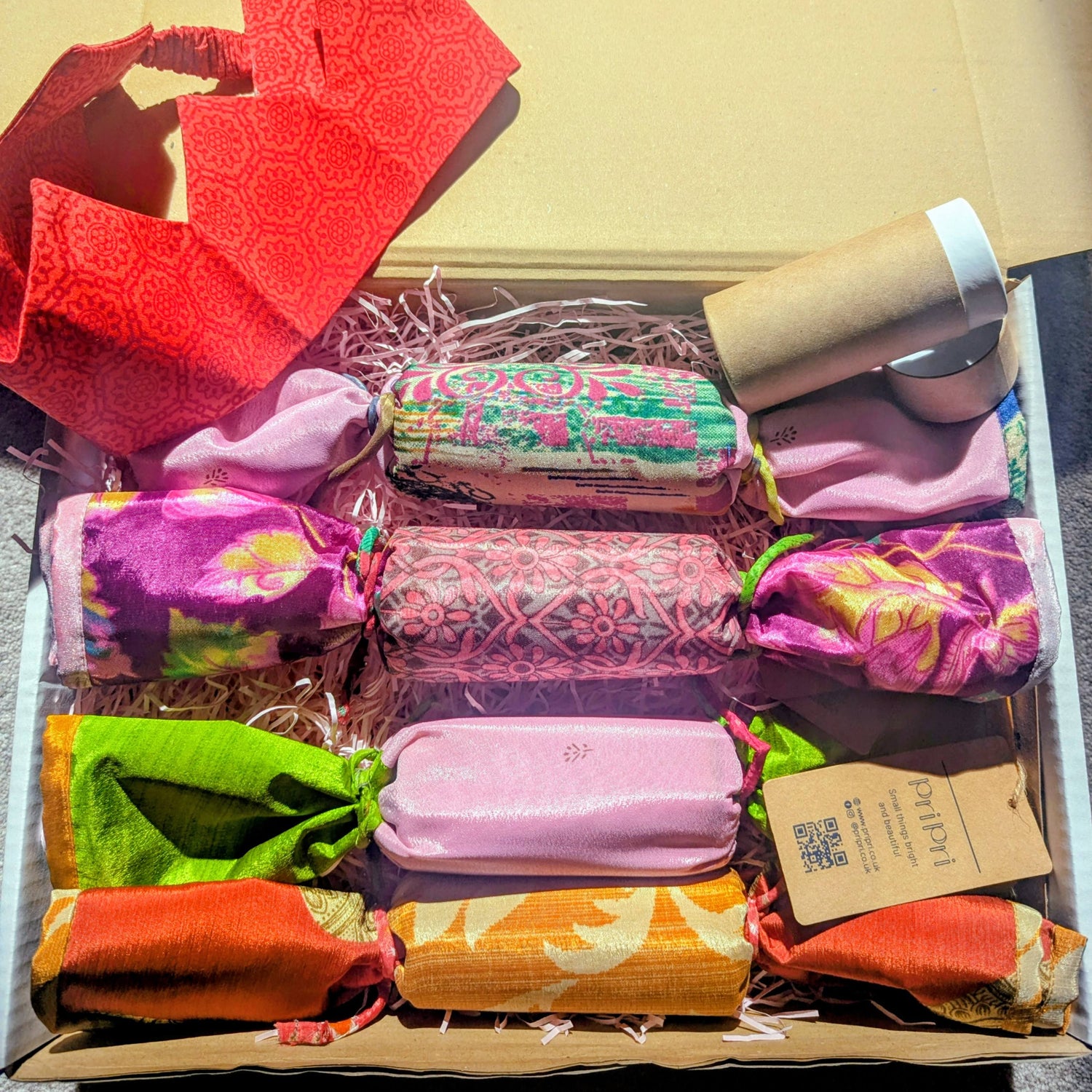 Assorted colourful sari crackers in a box